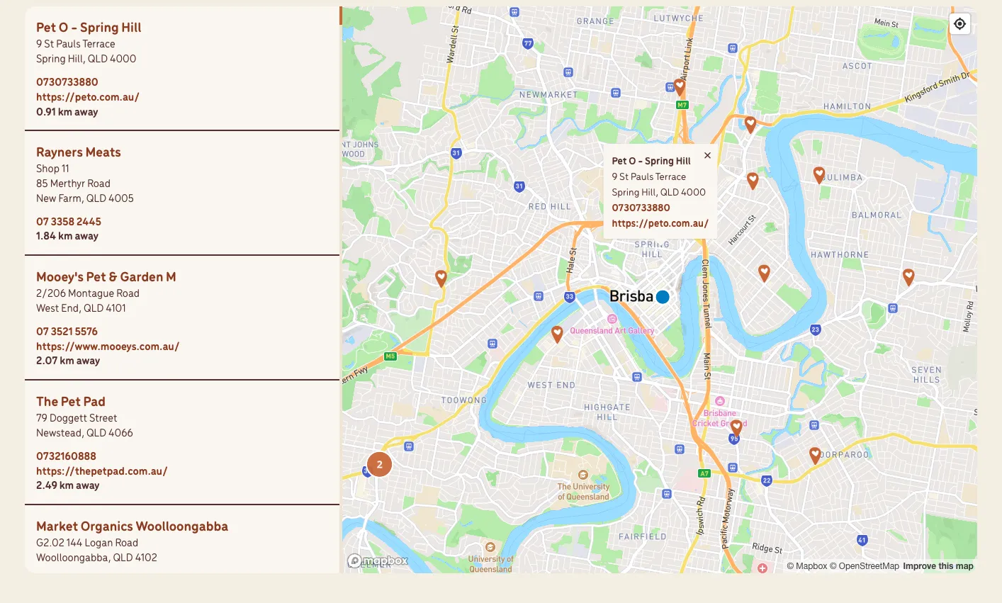 Map of Brisbane with pet store locations and a list of stores with addresses and contacts on the left.