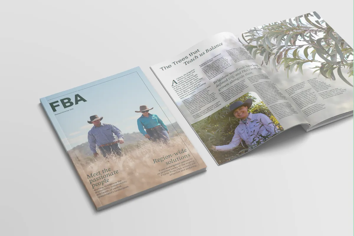 FBA magazine cover with two people walking in a field and an open page about trees with a photo of a person in a hat.