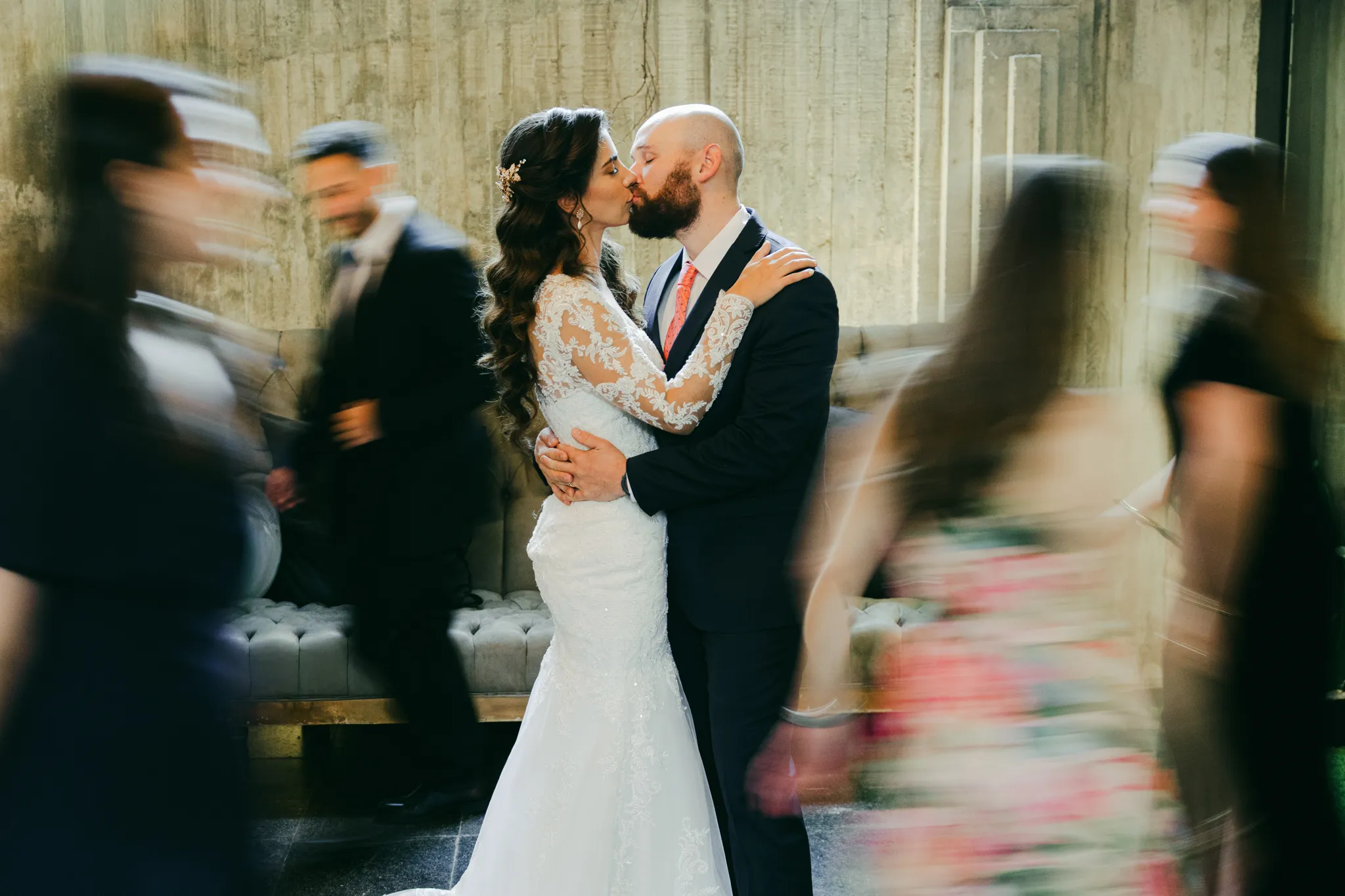 Austin Texas wedding photographer motion blur shot of bride and groom kissing during first dance