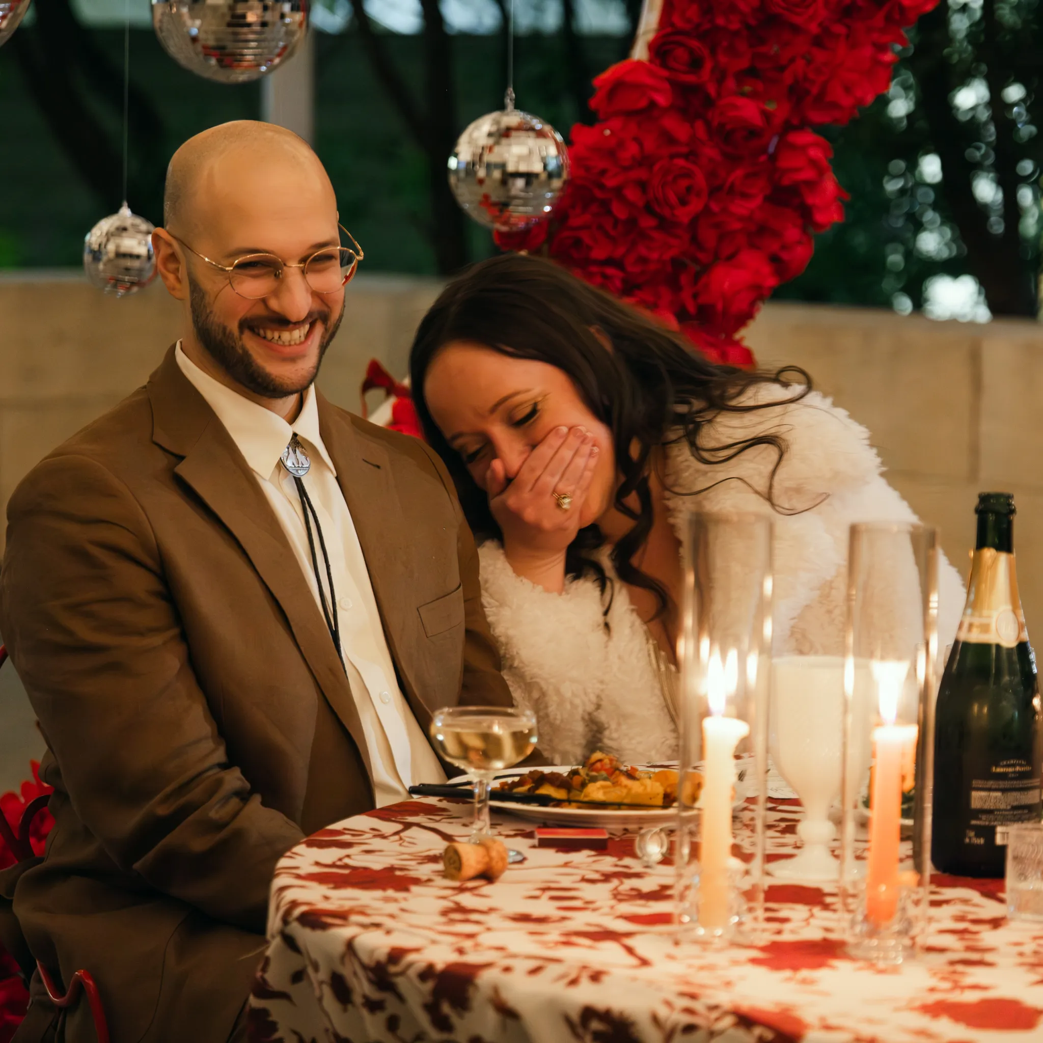 Marcela Briere Austin Texas wedding photographer portrait in black top against a gray background