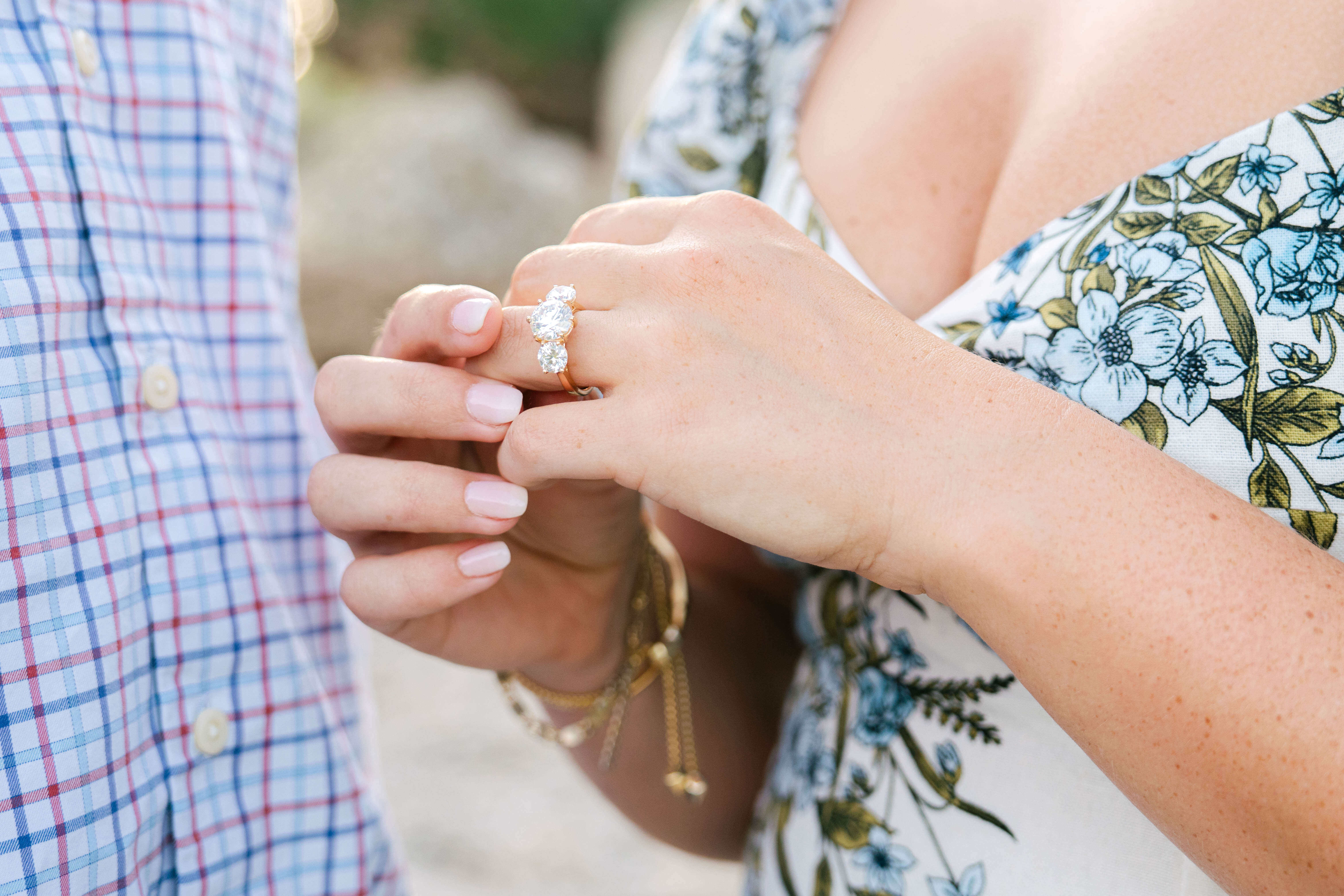 Close-up of engagement ring after surprise proposal at Zilker Park in Austin
