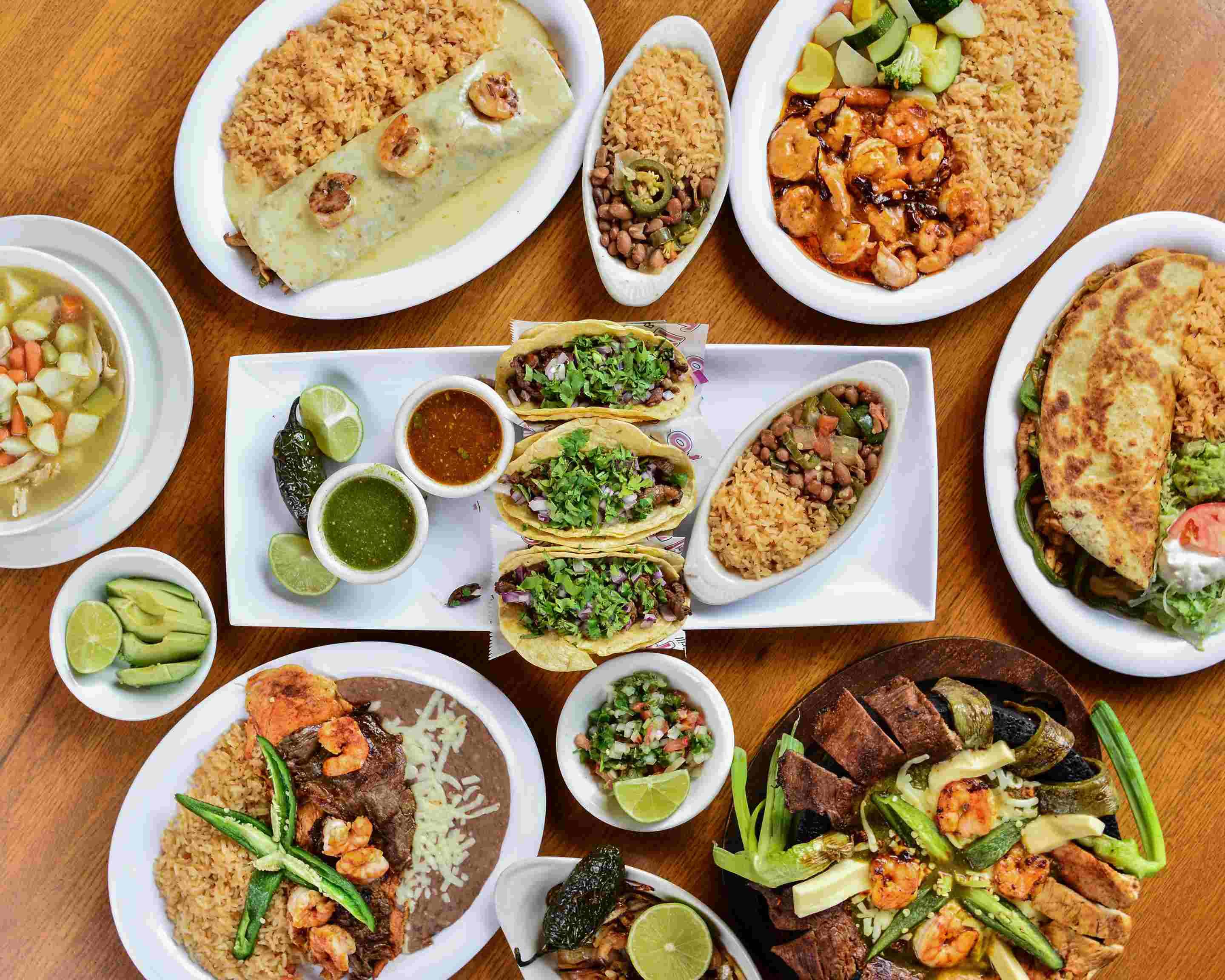 Young diverse couple having lunch with junk food