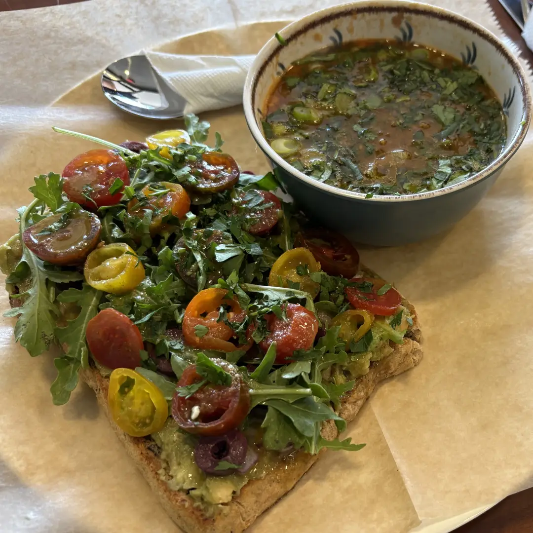 A bowl of soup and a flatbread representing food and drink services in Huntersville