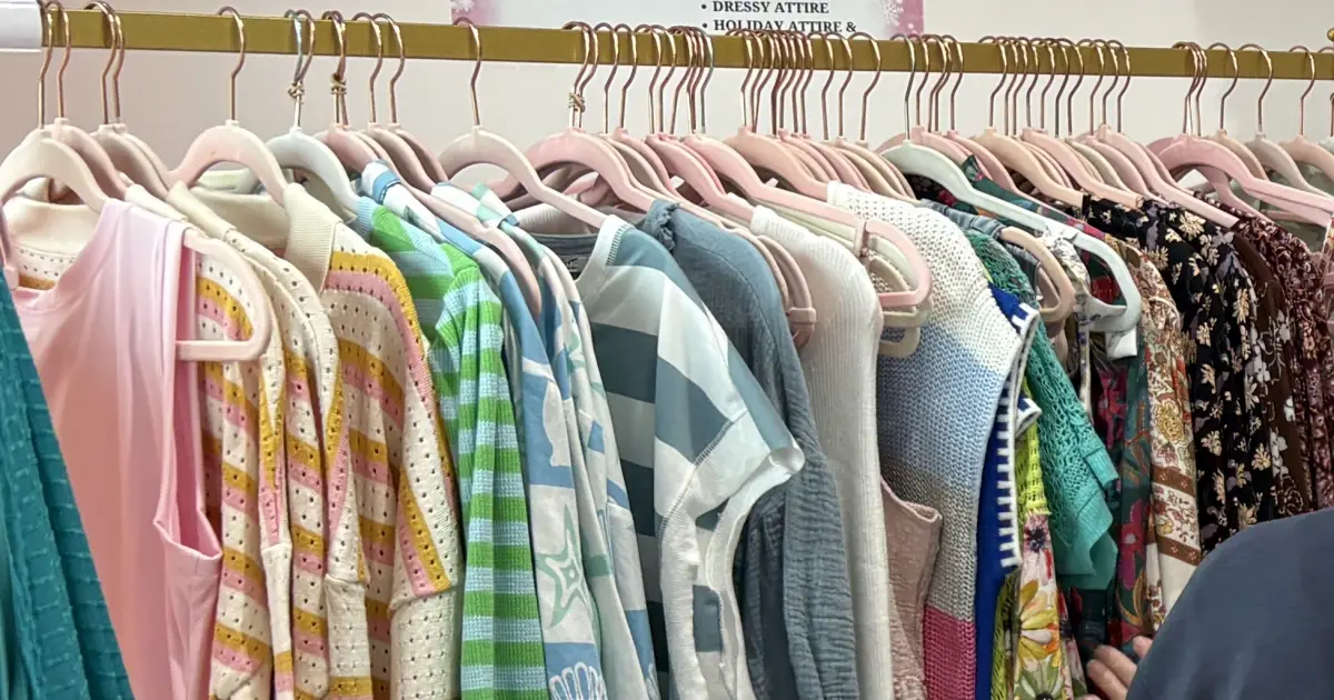 Colorful rack of women's clothing at BriVanna Boutique in Huntersville, NC