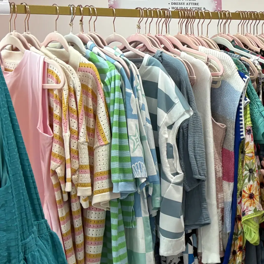 Colorful rack of women's clothing at BriVanna Boutique in Huntersville, NC
