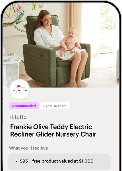 Woman sitting in a green recliner glider chair holding a smiling baby in a bright room.