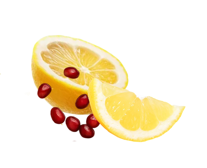 Half lemon and lemon wedge with scattered red pomegranate seeds on a black background.