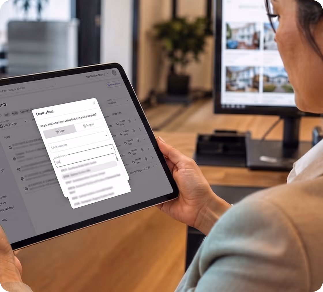 Person holding a tablet creating a form with options for form type and category in an office setting.