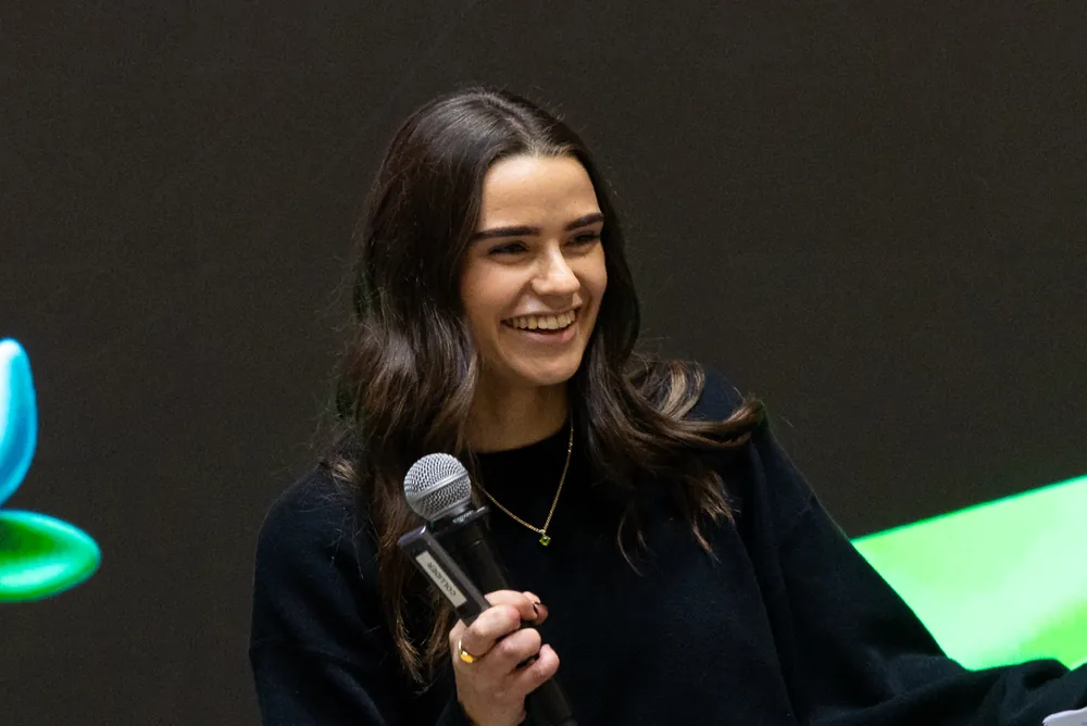 Aleisha Smith, Strategy Implementation Lead at Bridgit, smiling while speaking at a Bridgit event.