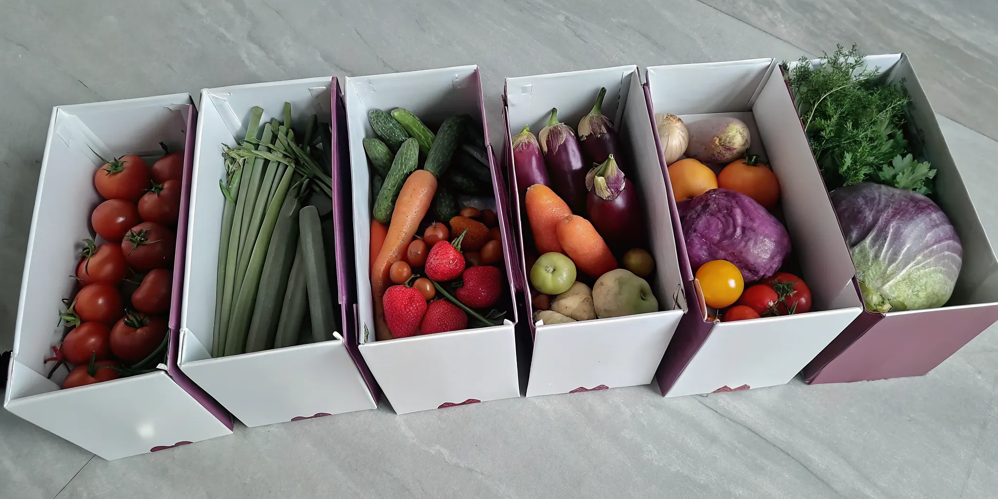 A Canadian grocery subscription box filled with fresh produce.