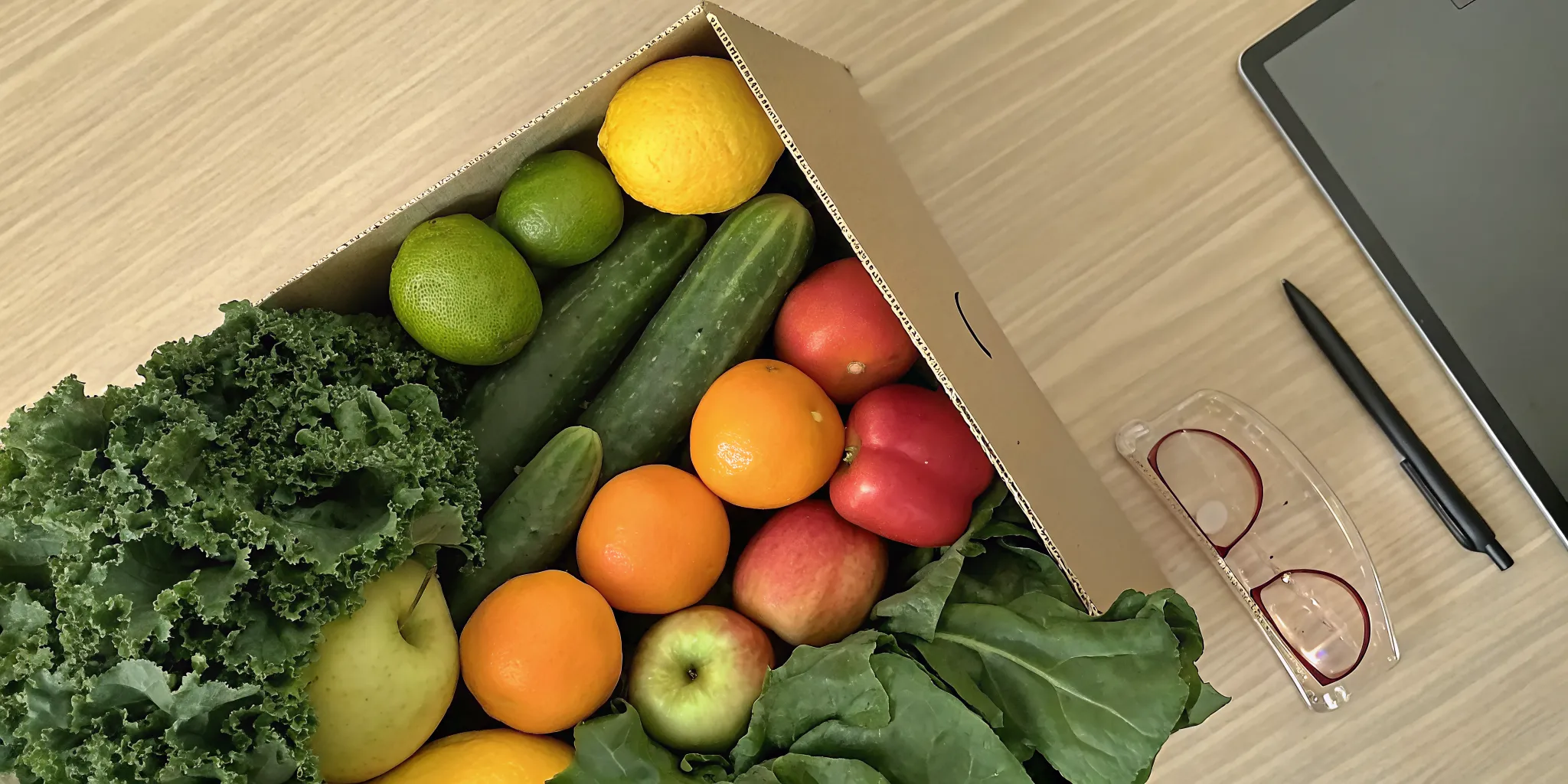 A fresh fruit and veg box being reviewed to determine if it is worth the cost.