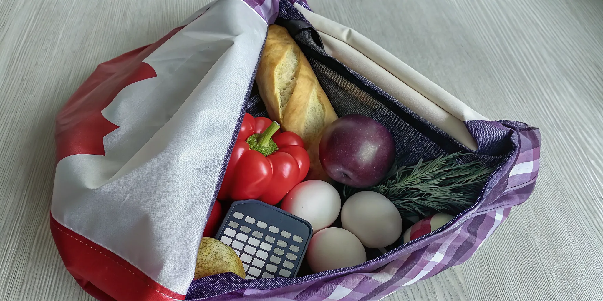 Canadian grocery basket arranged for a total cost comparison