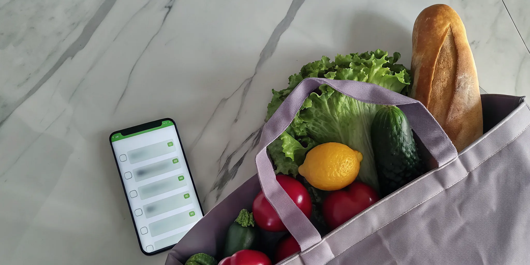 A person signing up for weekly grocery delivery on a smartphone next to a bag of fresh groceries.