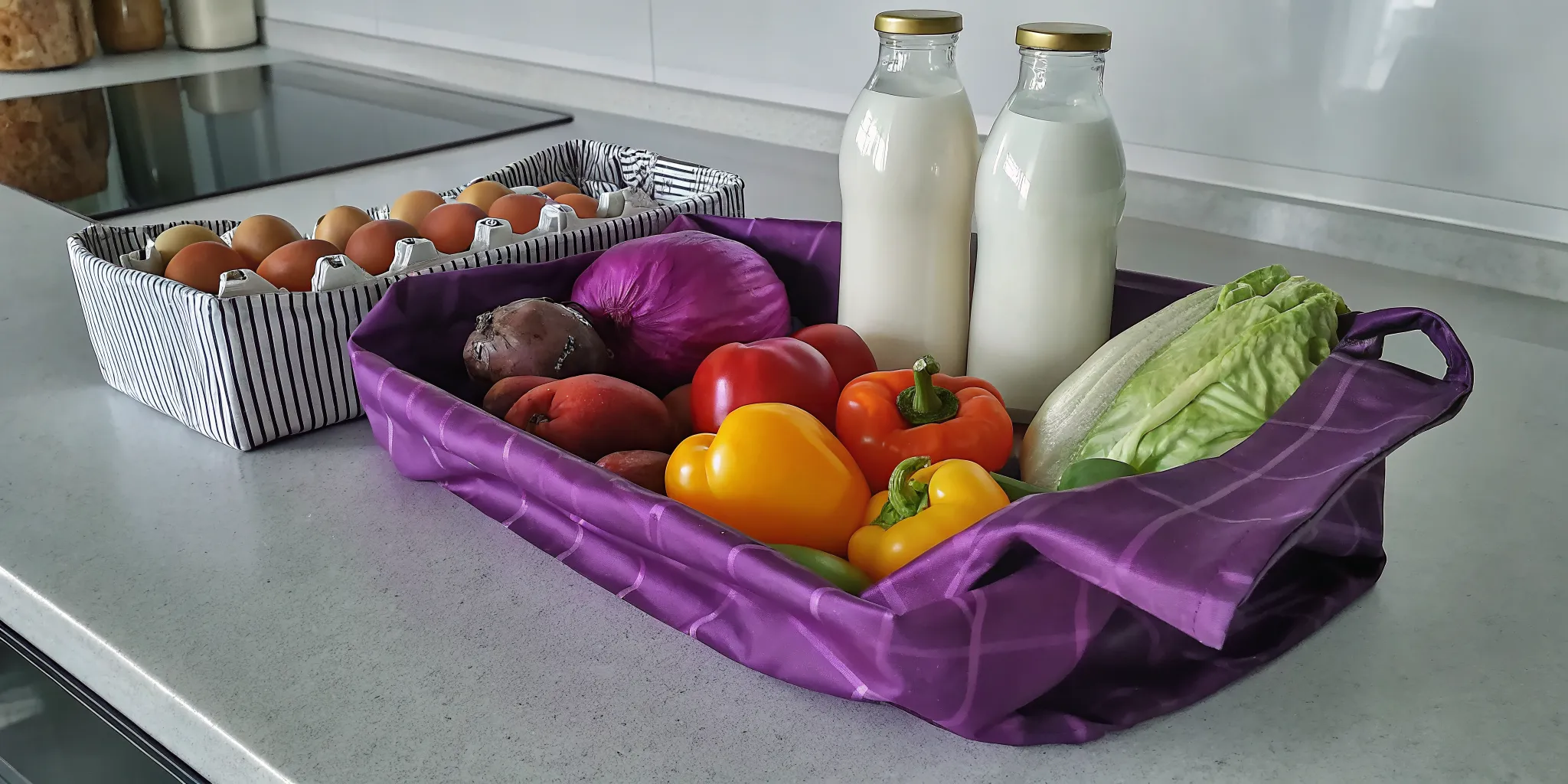 Assortment of dairy-free products including oat milk, almond milk, coconut milk, tofu, and fresh vegetables on a kitchen counter