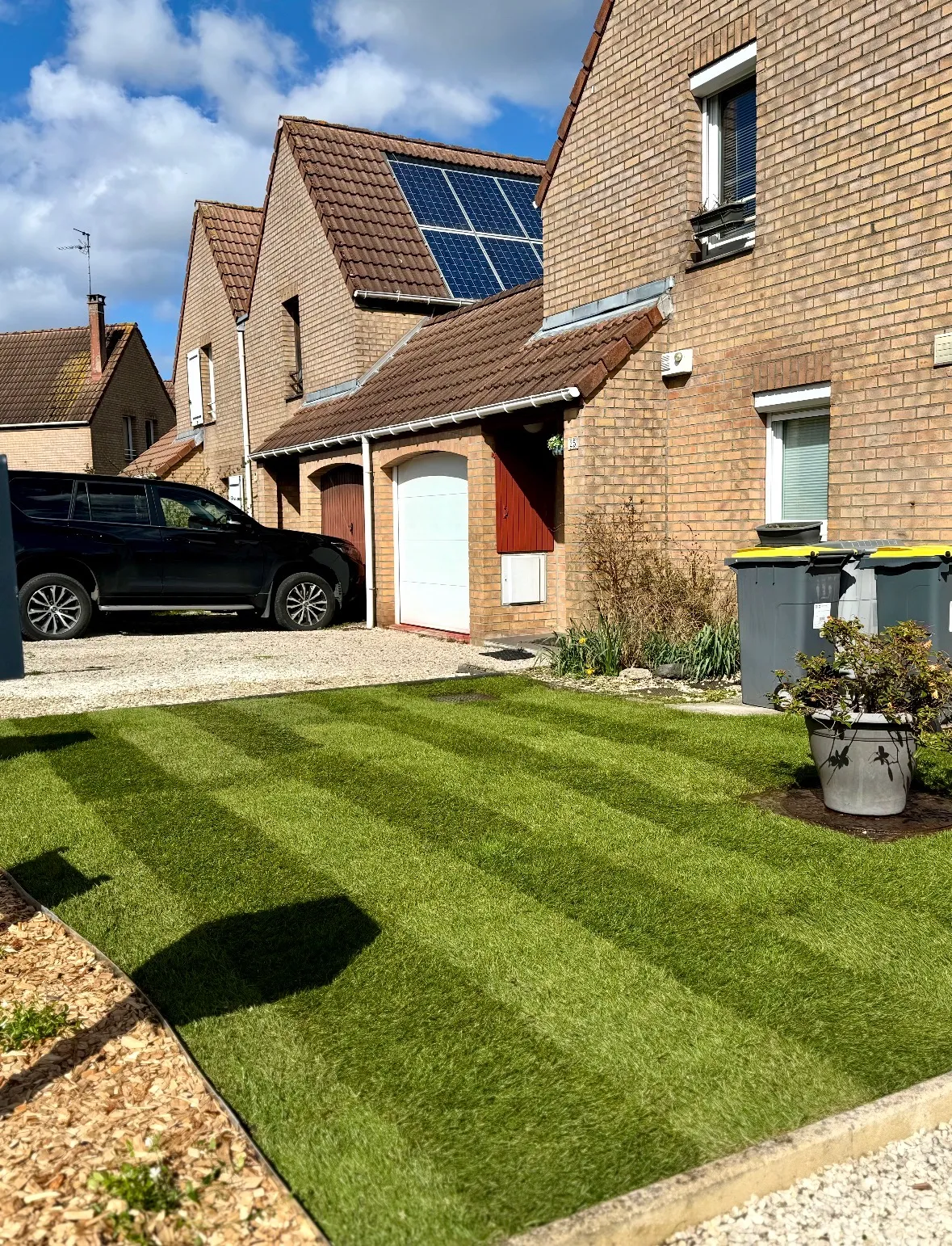 aménagement d'un jardin avec décoration caillou, gravier, arbres décoration Leers