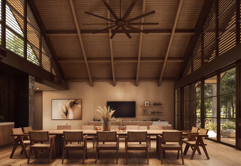 Spacious indoor dining room with a solid wooden table and sleek design at Hacienda La Danesa.
