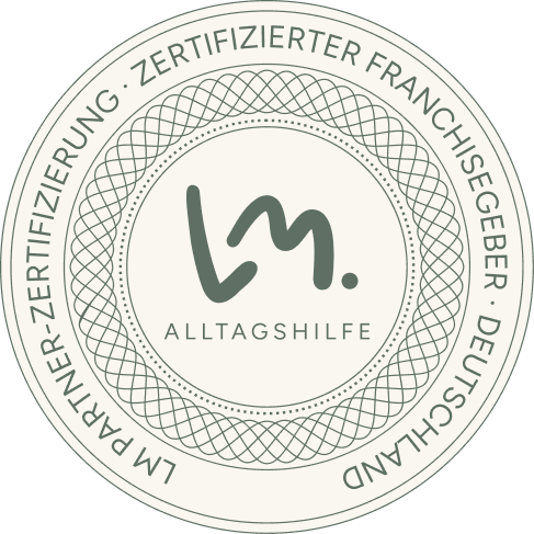 Siegel mit Text LM-Partner-Zertifizierung, zertifizierter Franchisegeber Deutschland, Alltagsilfe-Logo.