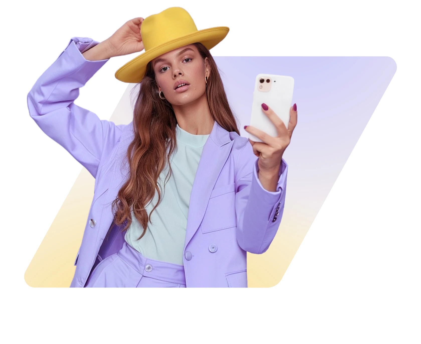 Young woman wearing a yellow hat and lavender suit taking a selfie with a white smartphone.