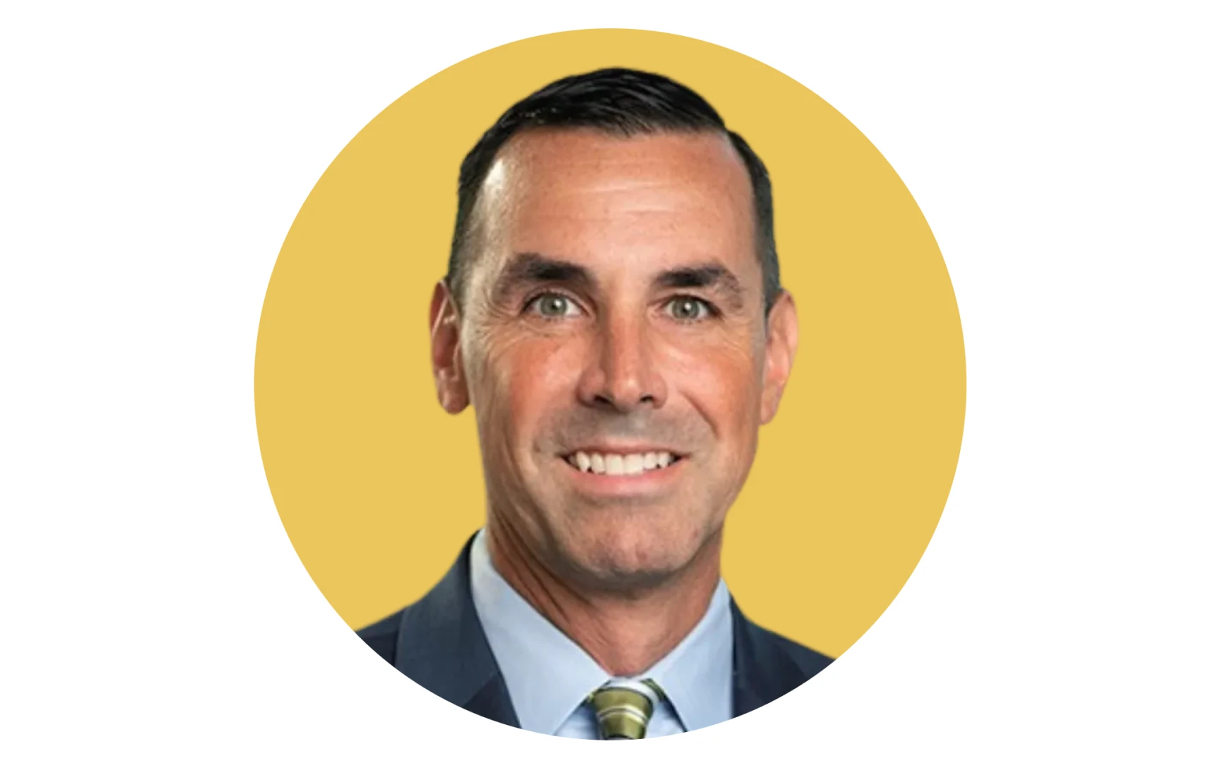 Portrait of a smiling man with short dark hair in a suit and striped tie against a yellow circular background.