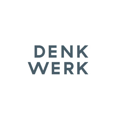 Text reading 'DENK WERK' displayed in dark, subtle font on muted teal background.