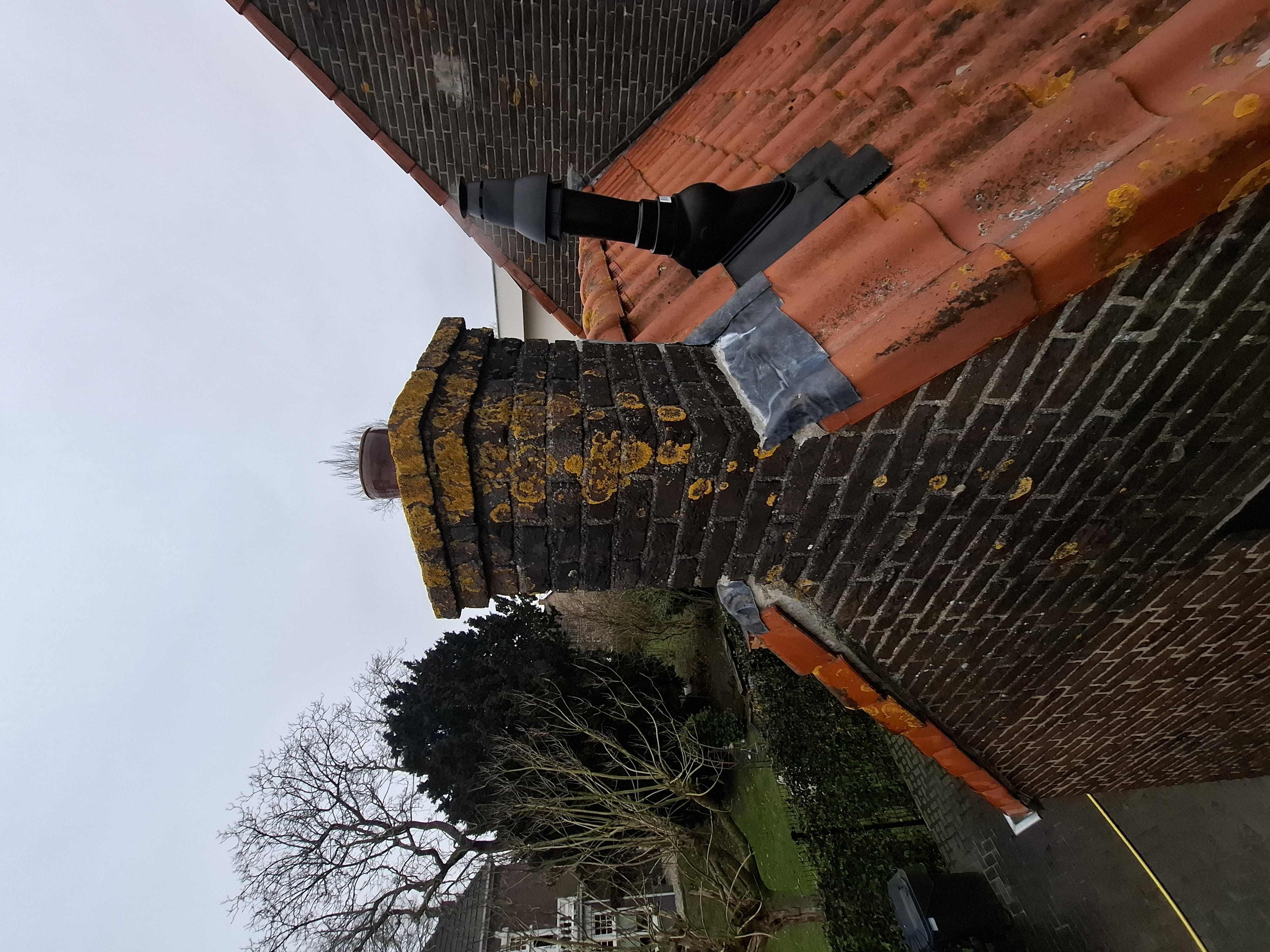 Zijgevel woning voor reiniging met slang