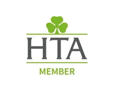HTA member logo with a green shamrock above and green text below on a white background.