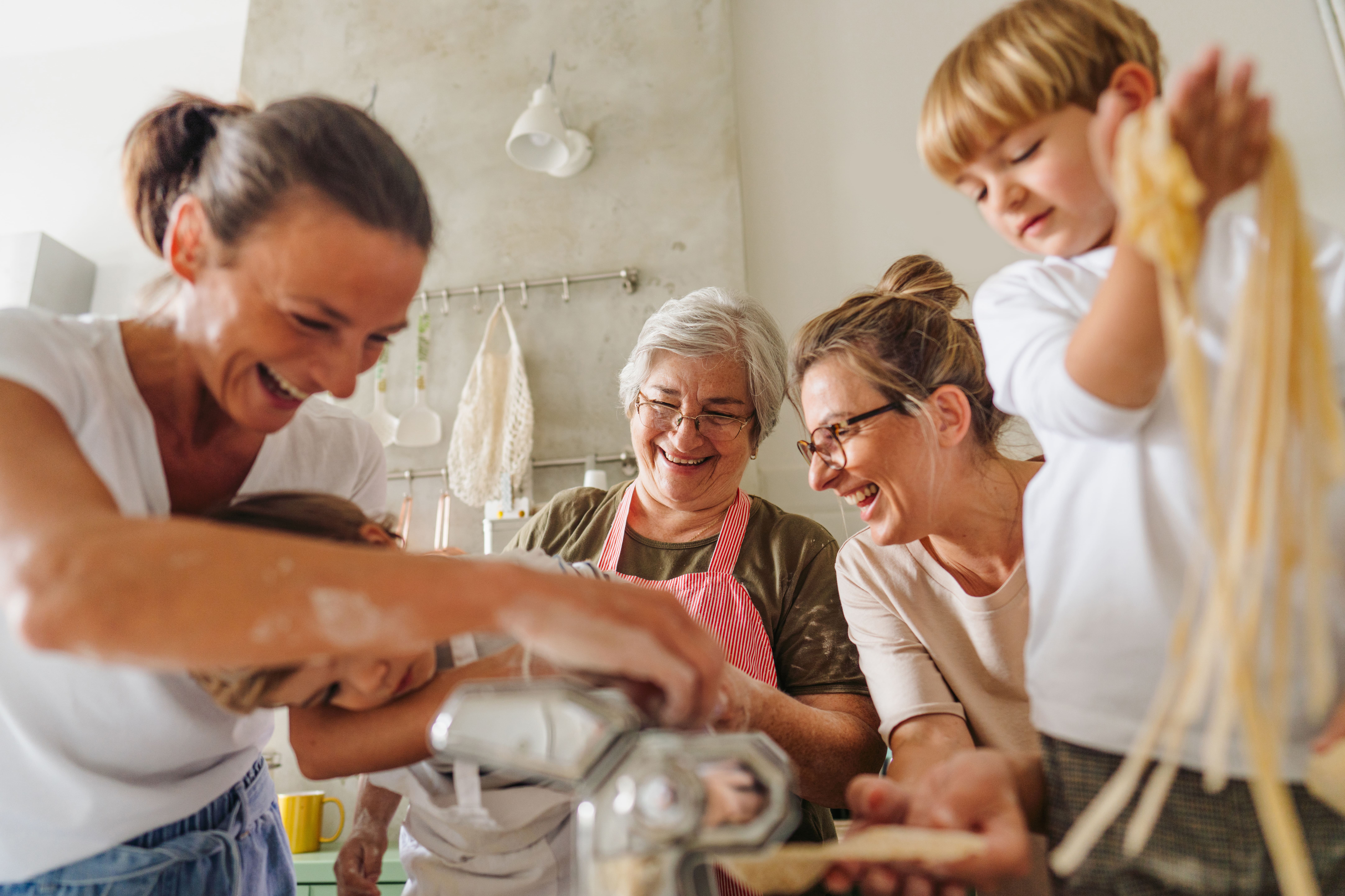 mother and grandmother making and preserving memories cooking with kids and sharing recipes 