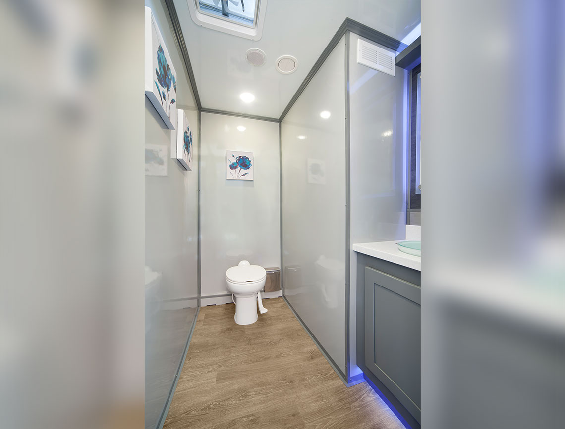 The men's stall in the two-stall luxury bathroom trailer