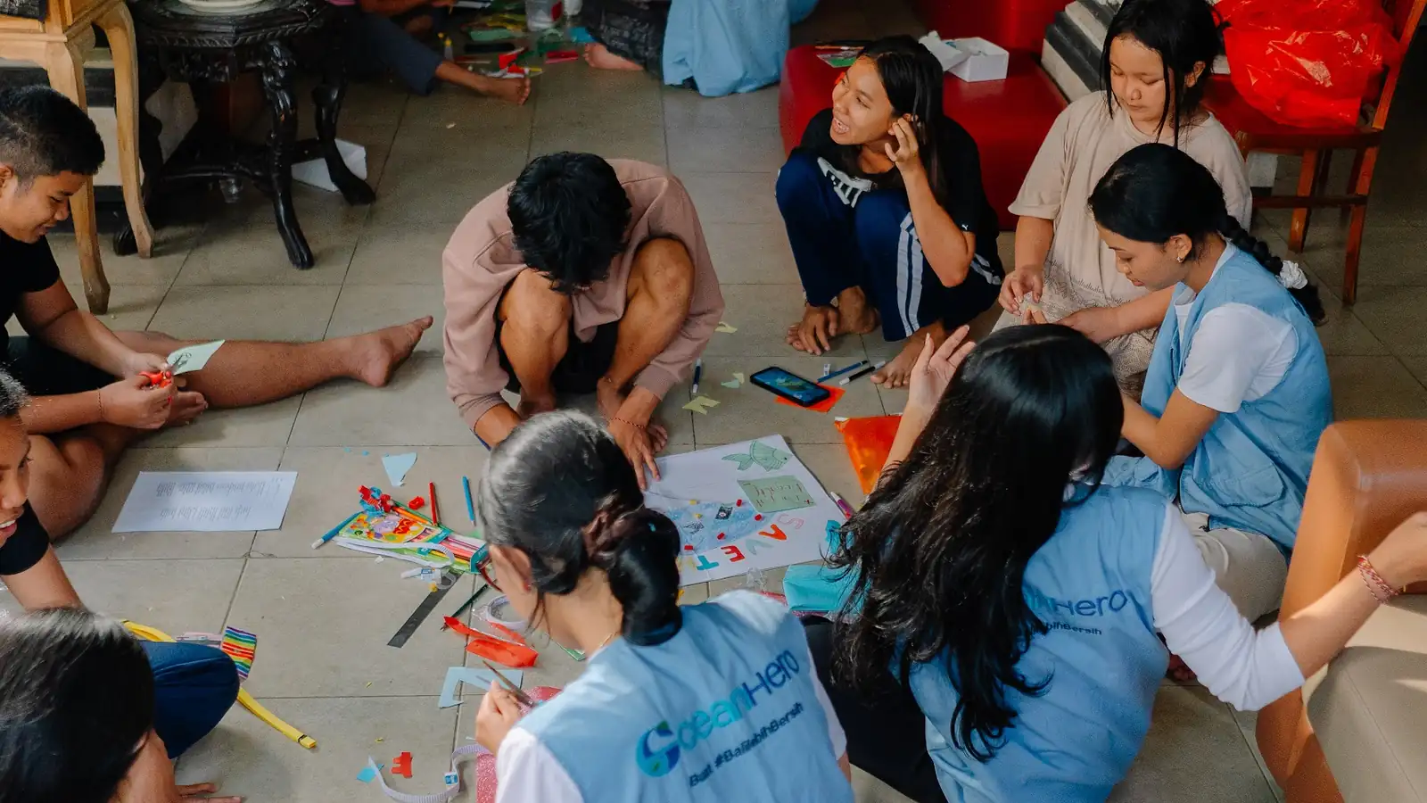 OceanHero volunteers making crafts from plastic waste with children at Sunya Giri Orphanage