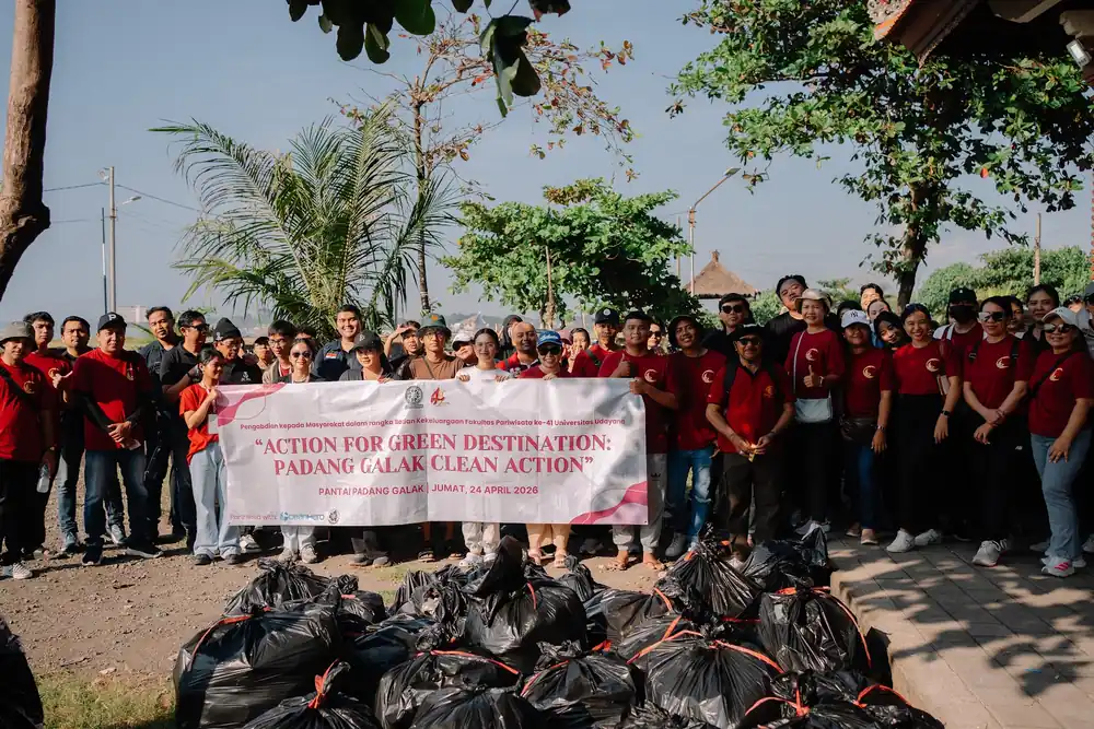 The full group of 115 volunteers with the collected waste at Padang Galak Beach
