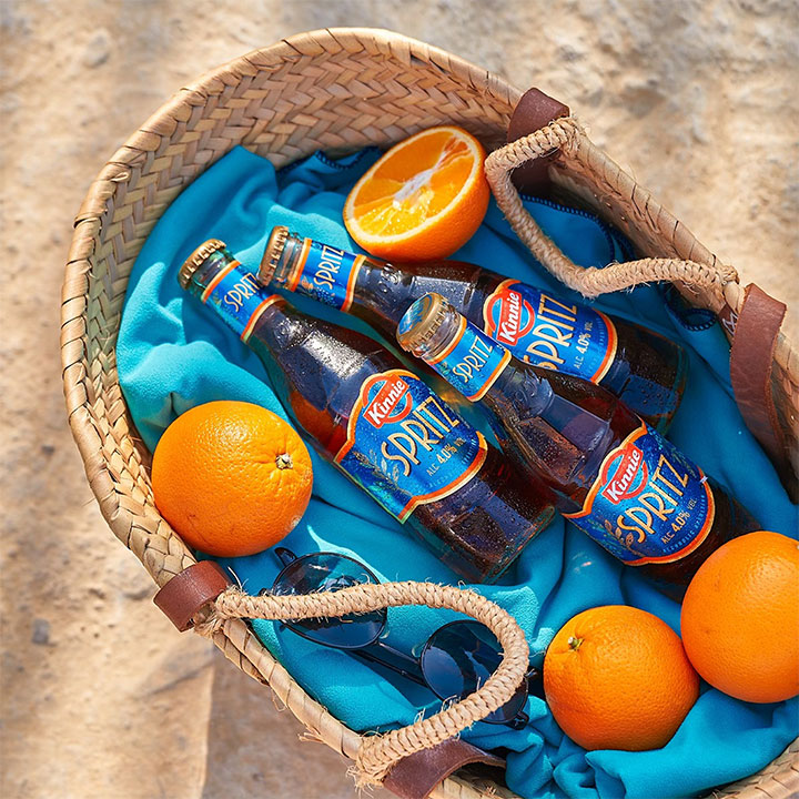 Kinnie Spritz in a picnic basket