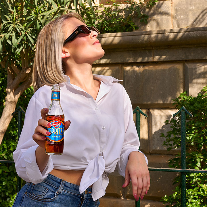 Woman enjoying Kinnie Spritz