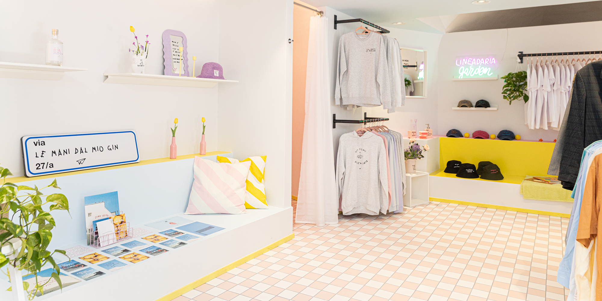 negozio creativo con colori pastello rosa e giallo in progetto di progettazione e realizzazione concept store a Bergamo