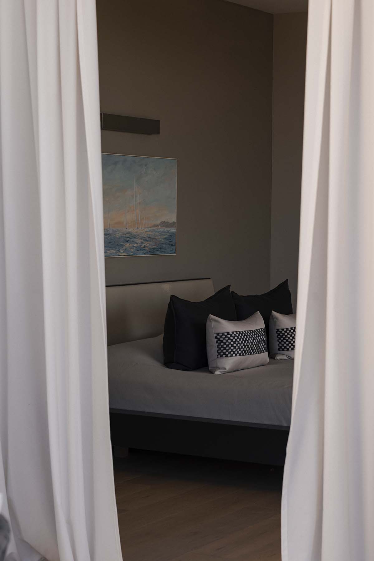 Villa bedroom with views towards the outdoors
