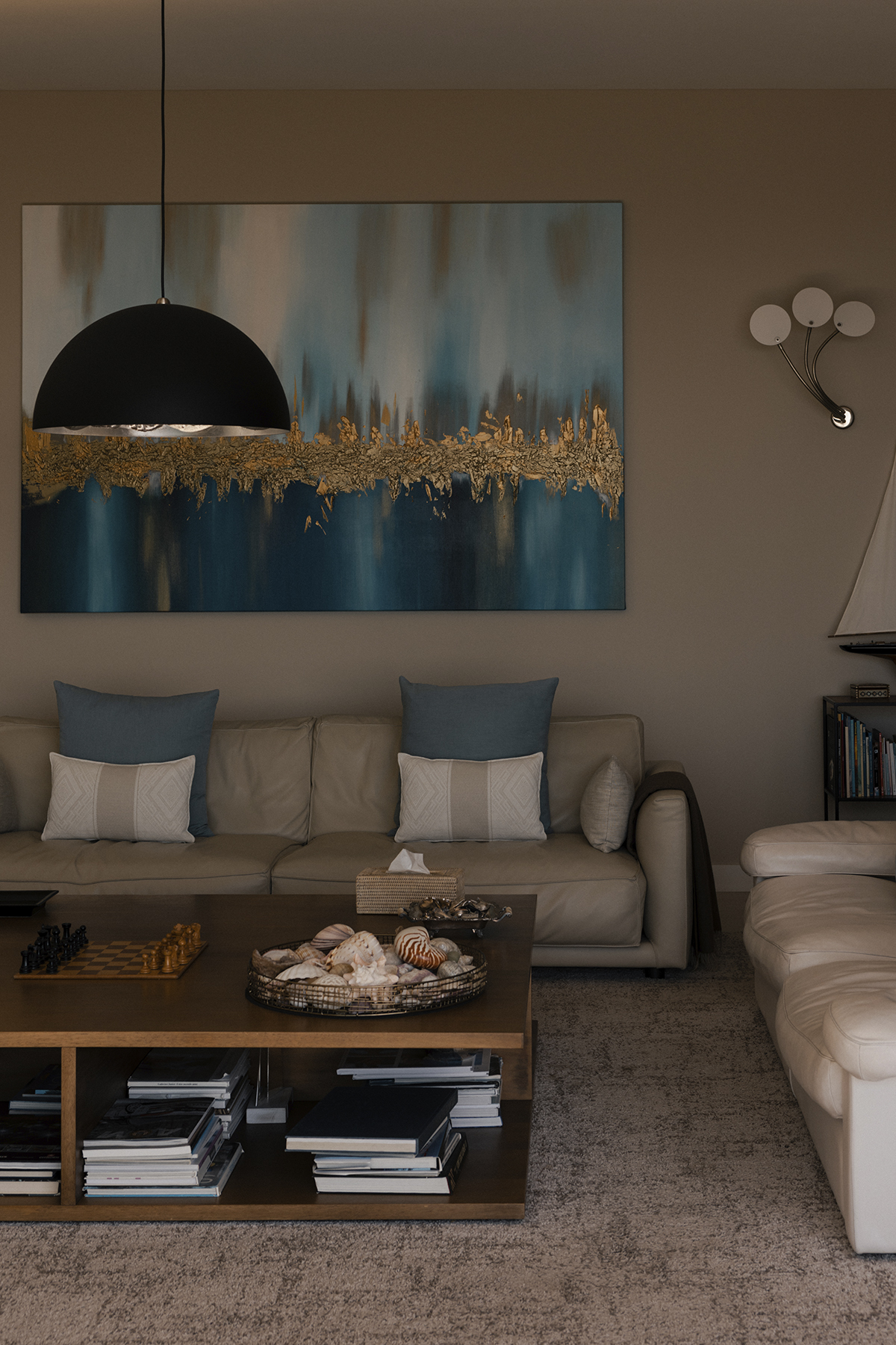 Villa living room with contemporary furnishings and artwork