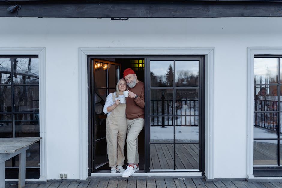Happy retired couple sitting on the porch of their Houston home - Reduce property taxes Houston Happy retired couple sitting on the porch of their Houston home - Reduce property taxes Houston