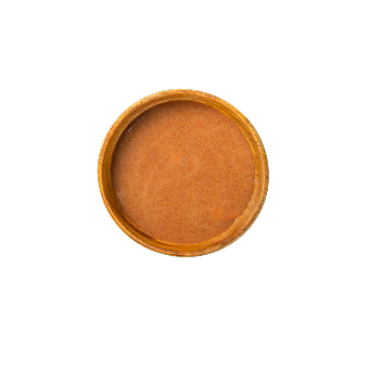 Eine Schüssel mit braunem Flüßigkeit.