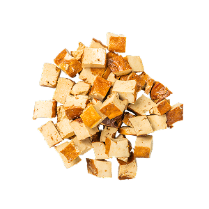 Tofu Stücke auf einem Stapel.