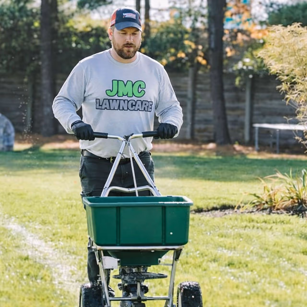 Professional lawn fertilizer treatment improving turf health by JMC Lawn Care in Collin County TX near me