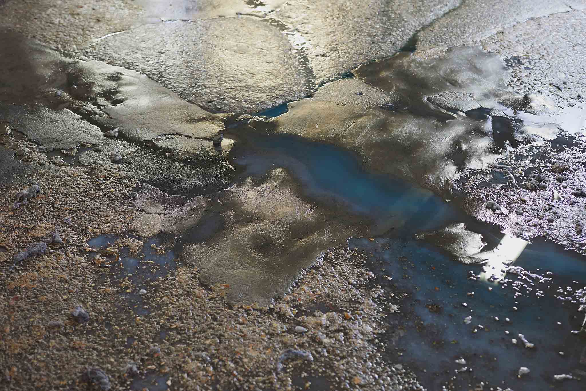 floor of factory soapy and dirty water from washing sheepskins devonia