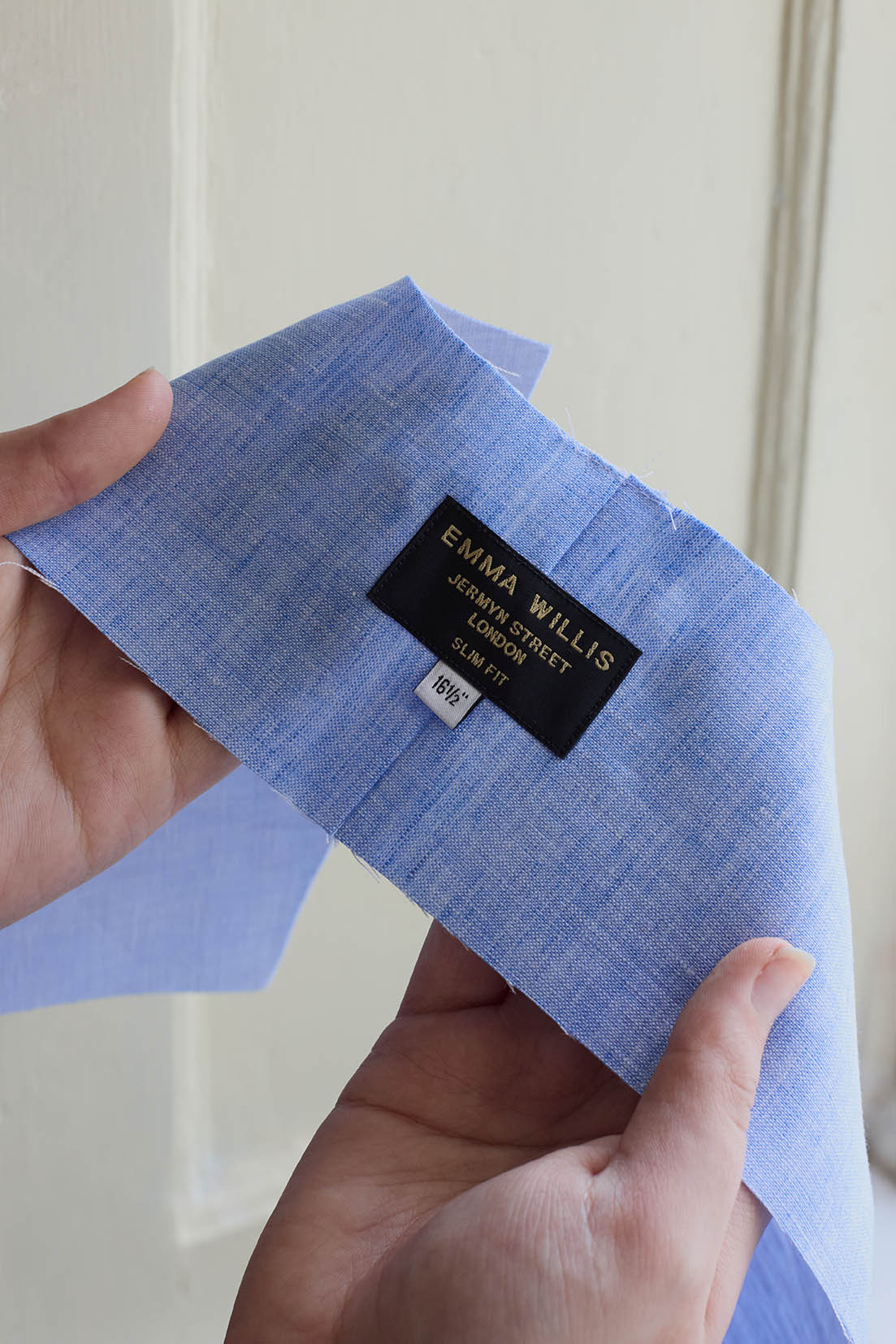 Emma Willis bespoke tailoring brand label on blue collar 