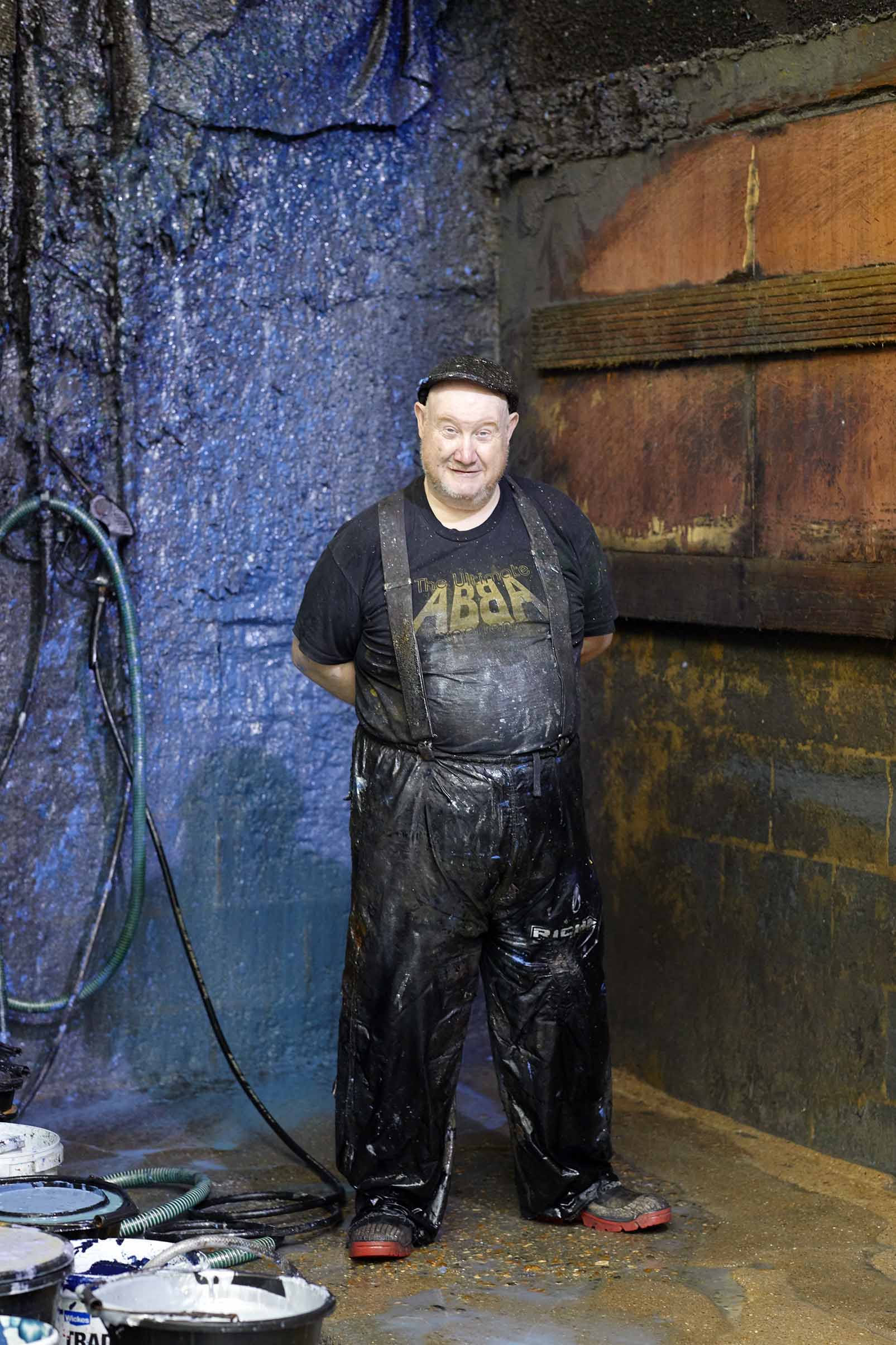 Ivo Prints man in dark overalls 