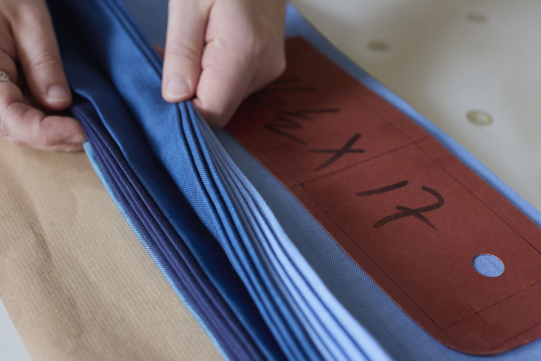 Emma Willis bespoke tailoring selection of fabrics different blues