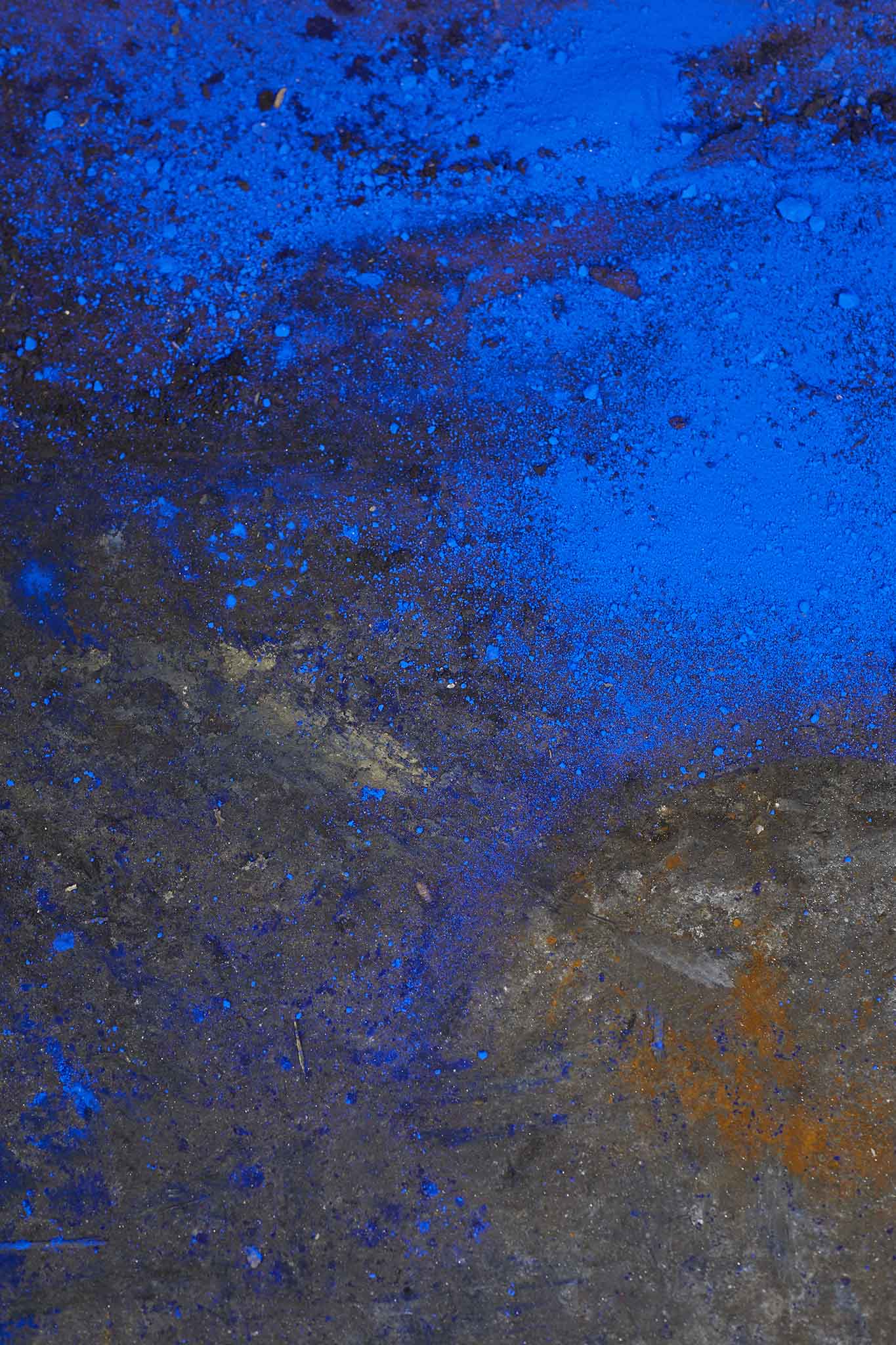 Mylands close up of bright blue surface beginning to rust 