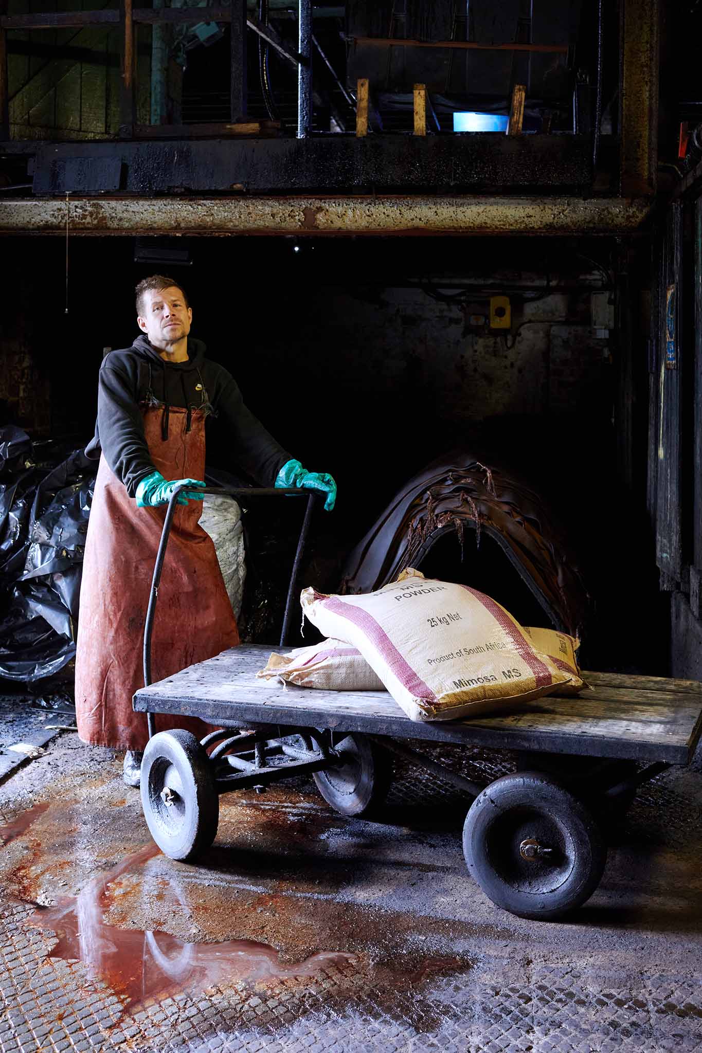 Thomas Ware and Sons worker inside leather factory 