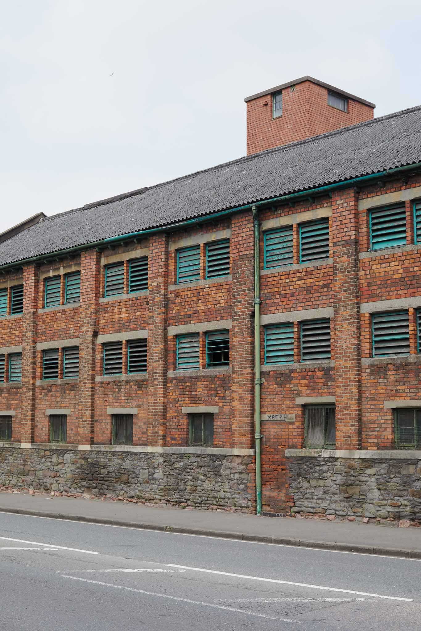 Thomas Ware and Sons outside of factory red brick multiple small windows