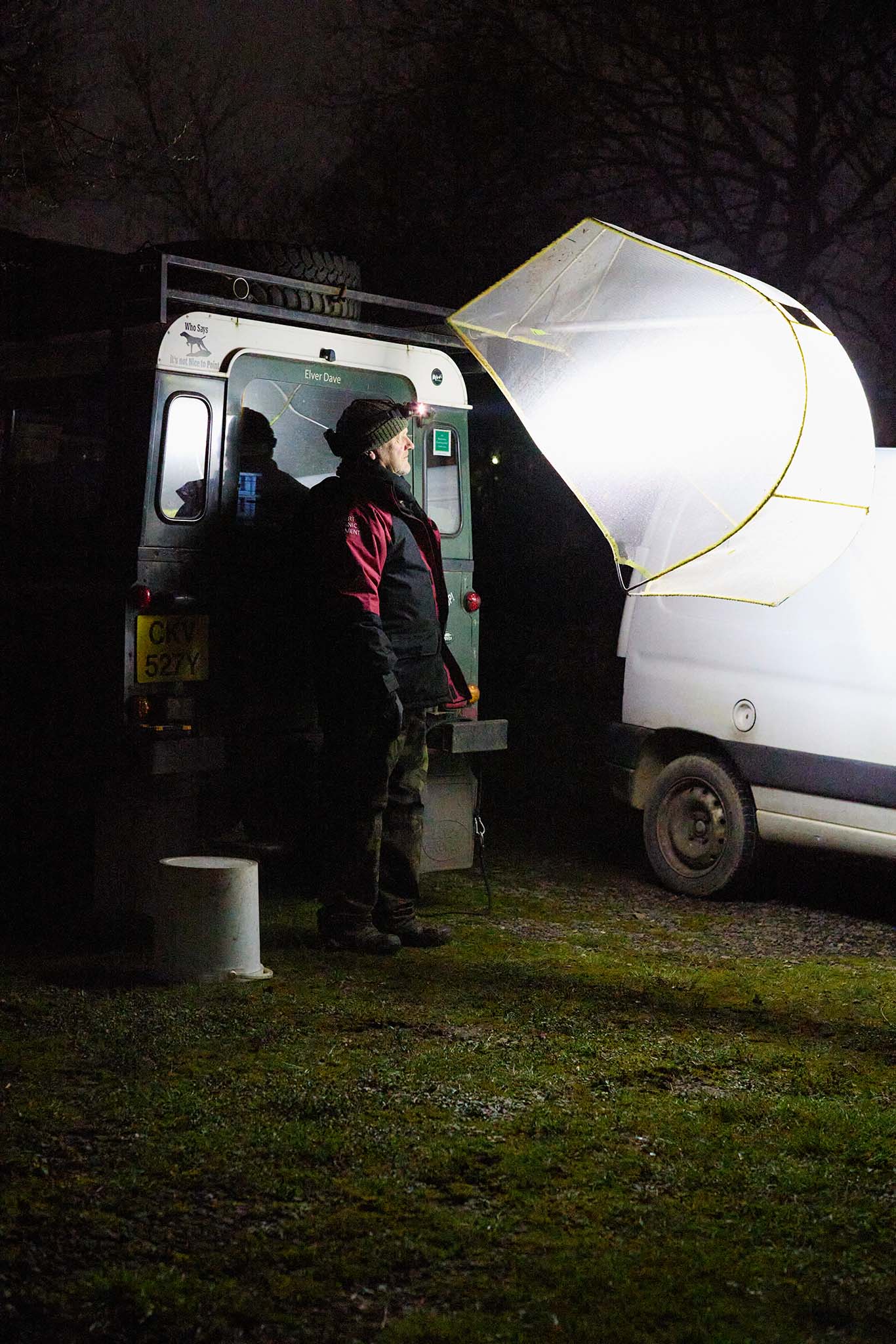 UK glass eels vans illuminated at night
