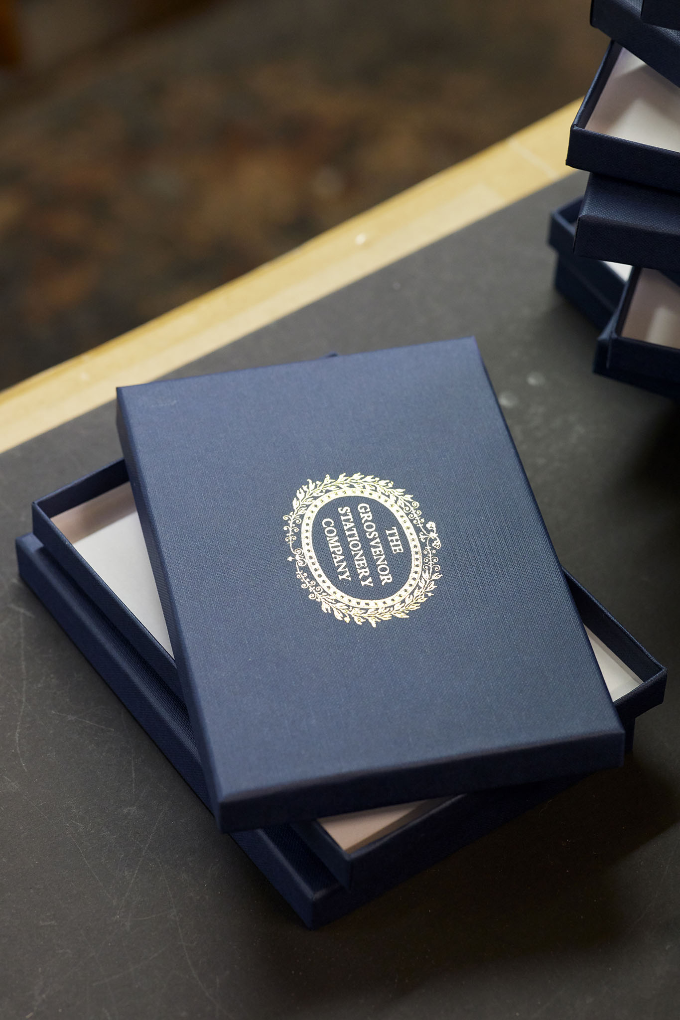 W MacCarthy & Sons embossed navy presentation box gold writing the grosvenor stationery company