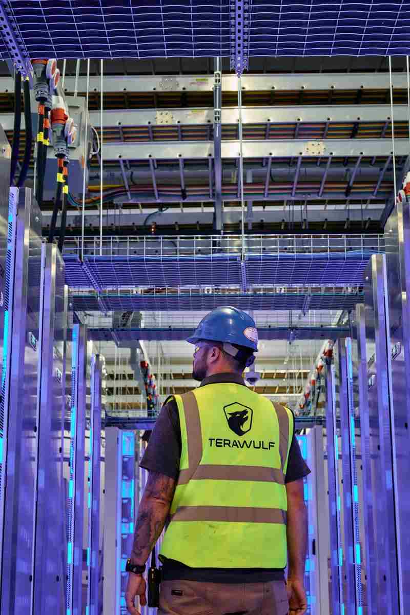 Terawulf technician walks data hall