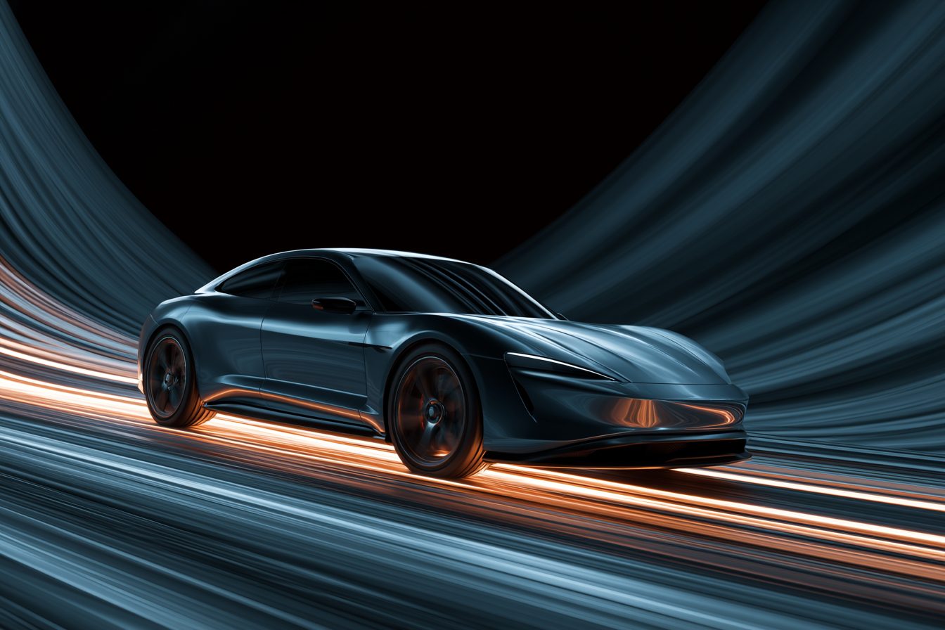 A sleek car on a glowing surface
